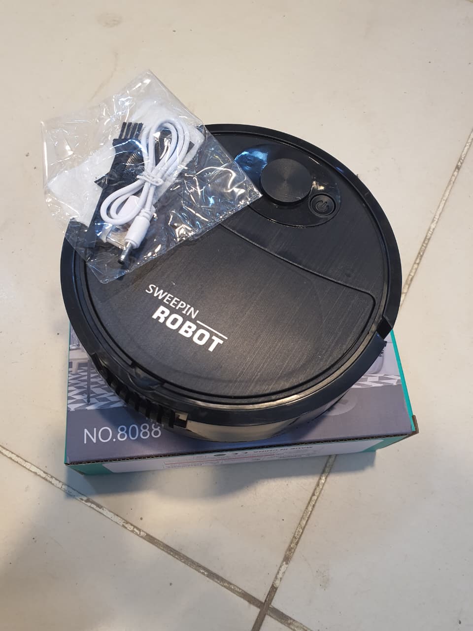 AUTOMATIC SWEEPING AND VACUUM ROBOT